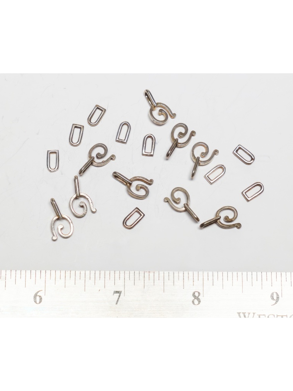 New - Group of 9 Sterling Silver Snail shaped clasps for jewelry making